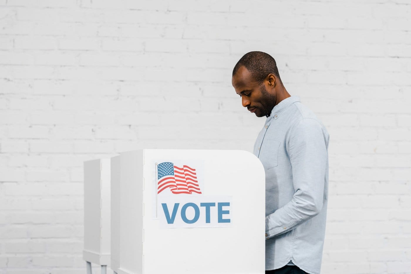 An immigrant casts his vote in the the U.S. presidential election.