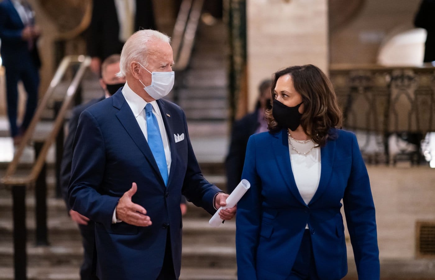 Biden and Harris walk and talk.