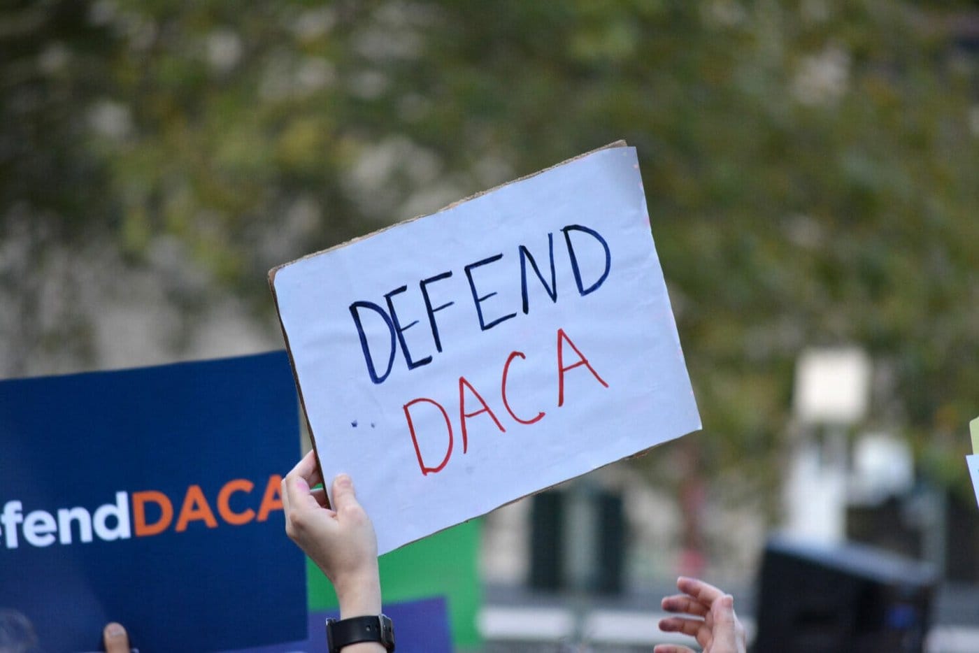 Defend DACA sign at a protest