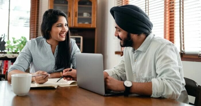 Immigrant working with team remotely