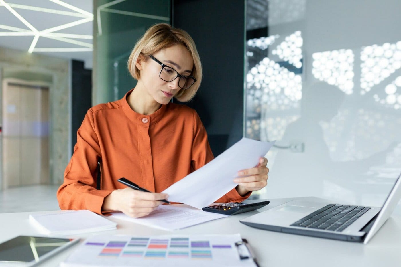 Employer filling out work visa paperwork