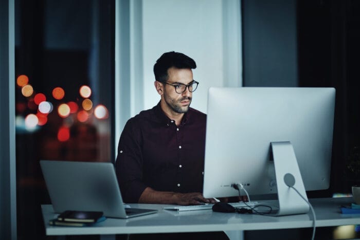 H-1B worker at his computer